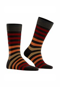 Calze a righe con colori nero, rosso, arancione e marrone. Realizzate in materiale morbido con un bordo a coste e una superficie liscia.