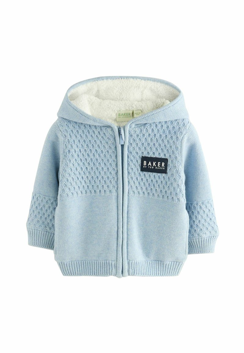 Lyseblå zip-up hoodie med et struktureret strikkemønster på toppen og glat stof nedenunder, fleece-foring indeni, og et sort mærke.