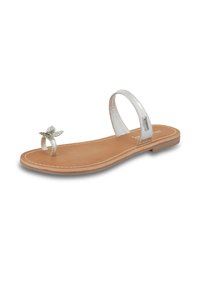 Strappy flat sandal in silver metallic material with a decorative butterfly accent on the toe post; brown textured footbed and a low heel.