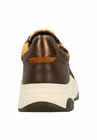 Brown leather sneaker with a textured finish, cream midsole, and orange fur accents. Features a padded heel and contrasting materials.