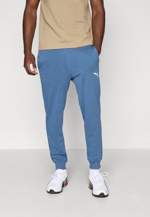 Puma ESSENTIALS JOGGER - Tracksuit bottoms - dark indigo