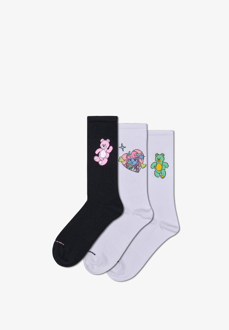 Trzy pary skarpetek: jedna czarna z różowym misiem, jedna biała z kolorowym sercem i postacią, oraz jedna jasnoszara z zielonym misiem.