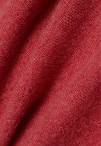 Rode gebreide stof met een zachte textuur, met een subtiele heather-effect, die fijne vezels en een zachte val toont.