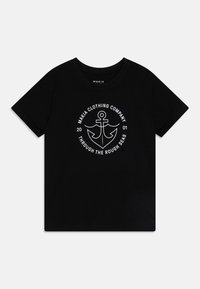 Black cotton t-shirt featuring a white anchor design, circle text "MAKIA CLOTHING COMPANY," and "THROUGH THE ROUGH SEAS" with a crew neck.