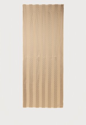 Beež värvi ristkülikukujuline tekstiiil vahelduvate tahkete ja mustriliste vertikaalsete triipudega.