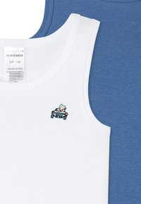 Two tank tops: one white with a cartoon car graphic and the other in blue. Both are made of organic cotton with seamless edges.