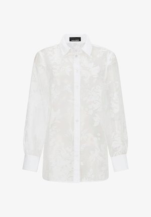 Weiße langärmelige Bluse mit Knopfleiste, floralem Jacquard-Muster, spitzem Kragen und breiten Manschetten von Goldner.