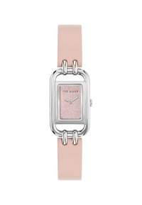 Montre carrée en ton argent avec un cadran pailleté rose et un bracelet en cuir rose clair. Dotée de quincaillerie argentée audacieuse reliant le bracelet.