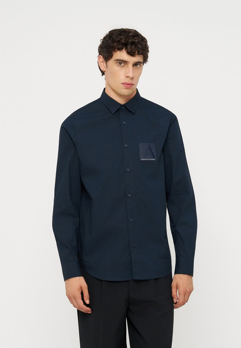 Camisa