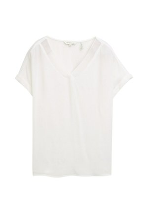 Fehér, rövid ujjú, V-nyakú felső, könnyű anyagból készült. Felgöngyölt ujjakkal és laza szabással rendelkezik, sima textúrájú.