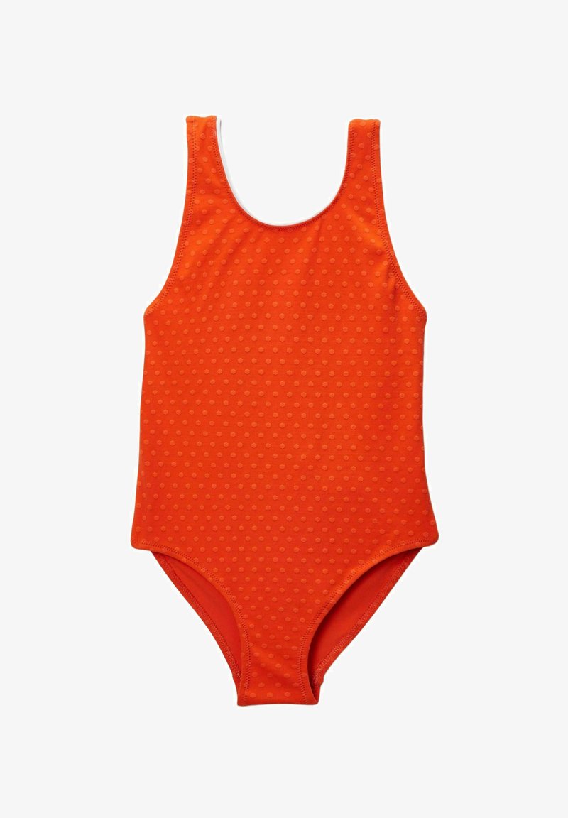 Maillot de bain orange avec un motif à pois, fabriqué en tissu extensible. Il présente un col rond et un design sans manches, taillé dans une forme classique.