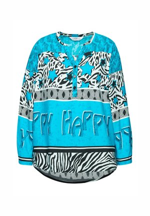 Turquoise langesleeve shirt met diverse patronen: sterren, zebra-strepen en de tekst "Happy". Geknoopte halslijn en ronde zoom. Niet-gefabriceerde stof.