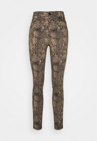 Leggings med ormtryck i bruna och svarta nyanser, med hög midja, två framfickor och en mjuk, stretchig textur.