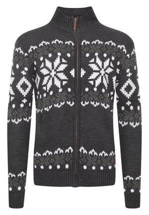 Siva zip-up jopica z belimi snežinkami in geometrskimi vzorci, z rebrastimi manšeti in robom ter visokim ovratnikom. Mehka pletena tekstura.