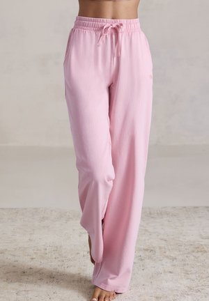 Helle rosa Sweatpants mit elastischem Bund und Kordelzug, ausgestattet mit einer lässigen Passform und weicher, glatter Textur.