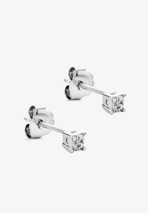 Orecchini a cerchio in argento sterling con un accento di zirconia cubica quadrata, finitura lucida e incastono a quattro graffette per una tenuta sicura.