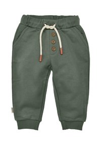 Grüne Sweatpants mit einem Kordelzugbund, drei Holzknöpfen, seitlichen Taschen und gerippten Bündchen. Baumwollmaterial mit einer glatten Textur.