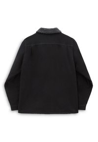 Veste noire à manches longues avec un col gris foncé texturé, coutures visibles et une coupe simple légèrement ample, vue de dos.