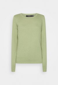 Maglione verde chiaro realizzato in tessuto di maglia testurizzata. Presenta maniche lunghe, un collo tondo e un orlo aderente.