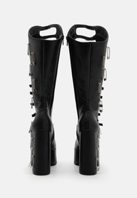 Koi Footwear MADHEAD SAFETY PIN LONG BOOT - Botas de cowboy/motociclista - black