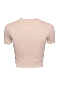 Light pink cropped t-shirt made of smooth, stretchy fabric. Features a round neckline and short sleeves, with a simple, unembellished design.