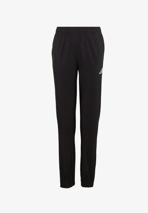 Pantalones deportivos negros con cintura y puños elásticos, con un pequeño logo blanco en la parte superior del muslo izquierdo.
