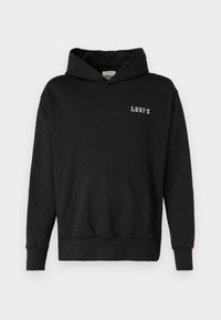 Felpa nera con cappuccio in cotone, dotata di tasca frontale e logo "LEVI'S" ricamato in bianco. Polsini e orlo a costine.