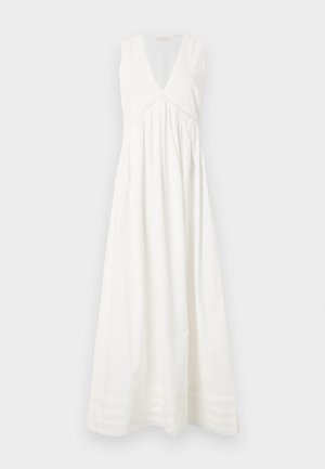 Λευκό αμάνικο μακρύ φόρεμα με βαθύ V-λαιμόκοψη, συγκεντρωμένη μέση και διακριτική δαντέλα μπροστά και στο τελείωμα, σε μονόχρωμο φόντο.