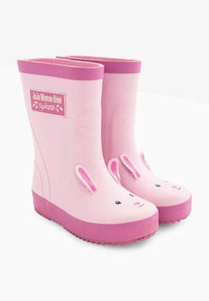 Botas de lluvia de goma rosa con diseño de cara de conejo, orejas caídas y suela texturizada rosa. Presenta una marca en el costado y un acabado suave.