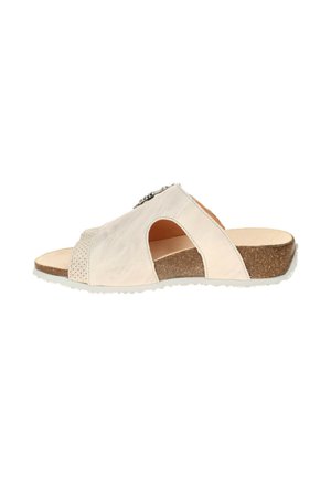 Beige offene Zehen Slip-On-Sandale mit seitlichen Ausschnitten, Korkkeilsohle und weißer strukturierter Gummilaufsohle.