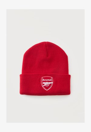 Bonnet en tricot rouge avec bord replié affichant le blason blanc du club de football Arsenal à l'avant.