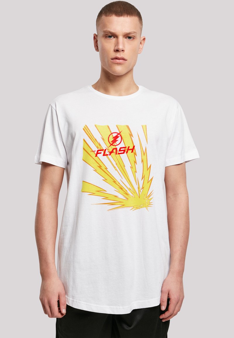 Hvid bomulds T-shirt med et gult og rødt "The Flash" grafik med strålende linjer, korte ærmer og rund hals design.
