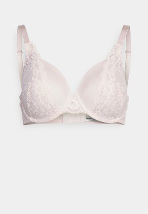Lace-trimmed light pink bra with molded cups and adjustable straps, featuring floral patterns and a smooth satin finish.