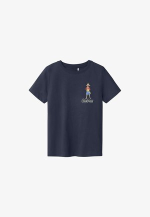 T-shirt bleu marine à manches courtes avec un petit dessin d'un personnage de dessin animé debout portant un chapeau de paille et le texte "One Piece" sur la poitrine.
