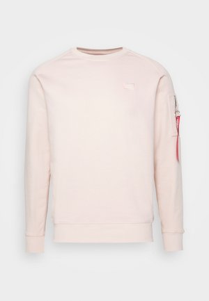 Hellrosa langärmliges Sweatshirt mit gerippten Bündchen und Saum, Rundhalsausschnitt und Reißverschlusstasche mit rotem Zipper am linken Ärmel.