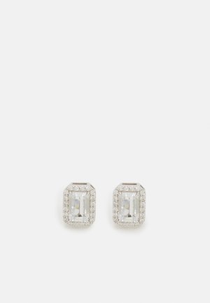 Klare krystal studs øreringe med rektangulære sten, omgivet af en sølvfarvet ramme og små runde accentsten. Geometrisk design.