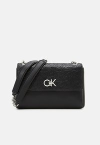 Calvin Klein LOCK CROSSBODY - Torebka
