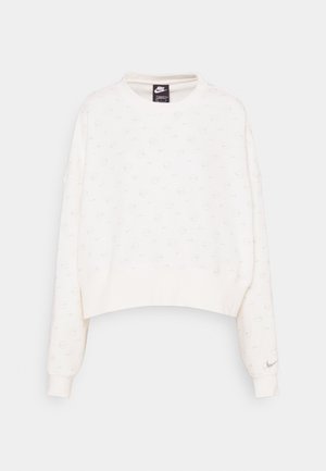Cropped white sweatshirt made from soft fabric, featuring a subtle pattern of logos, ribbed cuffs, and a crew neckline.