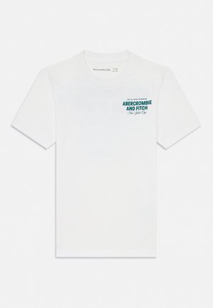 T-shirt blanc à manches courtes pour enfants avec le texte « Abercrombie and Fitch New York City » en vert sarcelle sur la partie supérieure gauche de la poitrine. Taille 7/8.