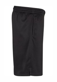 Pantaloni sportivi neri realizzati in tessuto a rete traspirante. Presentano un elastico in vita e fessure laterali per facilitare i movimenti.