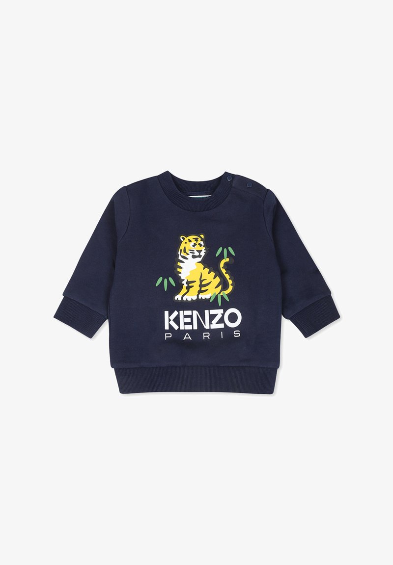 Sweat-shirt bleu marine à manches longues. Équipé d'un graphisme de tigre jaune et du texte « KENZO PARIS » en blanc. Matière en coton doux, poignets côtelés.