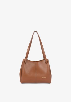 Brown leather tote bag with two shoulder straps, soft texture, structured shape, and a gold logo detail at the front center.