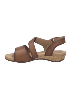 Brown leather open-toe sandal with crisscross straps, cork wedge heel, and adjustable ankle strap, shown in side profile.