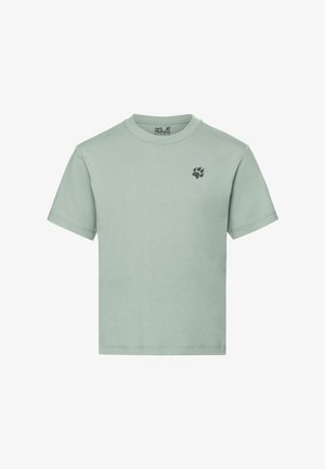 Heleheline beež lühikeste varrukatega ümmarguse kaelusega T-särk, millel on ülemisel vasakul rinnal Jack Wolfskini käpajälje logo.