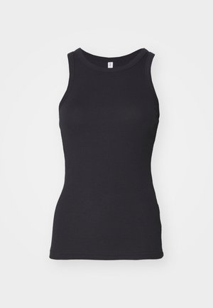 Svart ermeløs tank topp med rund hals. Laget av myk bomull, har den en tettsittende silhuett og en jevn tekstur.