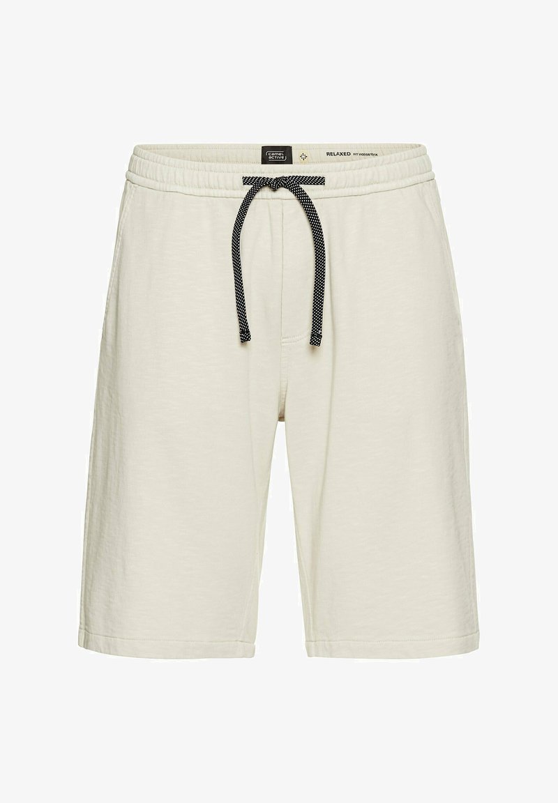 Shorts décontractés de couleur crème en tissu doux, avec une taille élastique et un cordon de serrage orné d'un motif noir et blanc.