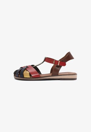 Leder-Sandalen mit mehrfarbigen Riemen in Rot, Braun, Gelb und Marineblau. Offenes Design mit flacher Sohle und verstellbarem Schnallenriemen.