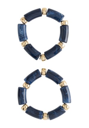 Pair of hoop earrings with alternating rectangular dark blue marbled and small gold-tone beads.