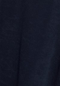Tecido azul marinho com uma textura suave e lisa, apresentando uma aparência uniforme, sem padrões ou hardware visível.