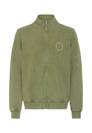 Olive green zip-up sweatshirt with high collar and ribbed cuffs. Features a small circular graphic on the left chest. Soft texture.